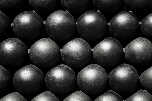 A sequence of abstract shapes representing a structured process.